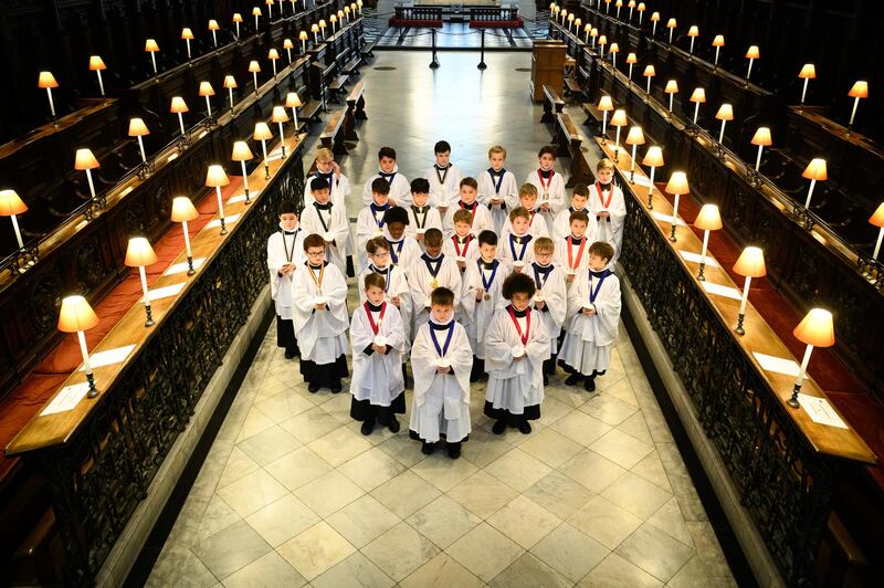Choristers from the St Paul's Choir pose for photographers at St Paul's Cathedral on December 14, 2020 in London, England. The cathedral live-streamed its Christmas concert for free on Thursday, December 17. Getty Images