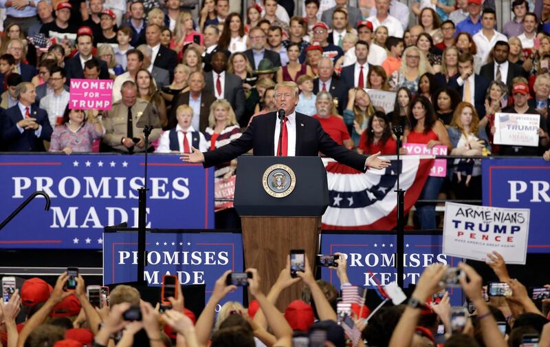 In this May 29, 2018, photo, President Donald Trump speaks at a rally in Nashville, Tenn. Trump fabricated history when it came to the 2016 election, his achievements on the opioid epidemic and a congressmanâ€™s voting record on taxes. (AP Photo/Mark Humphrey)