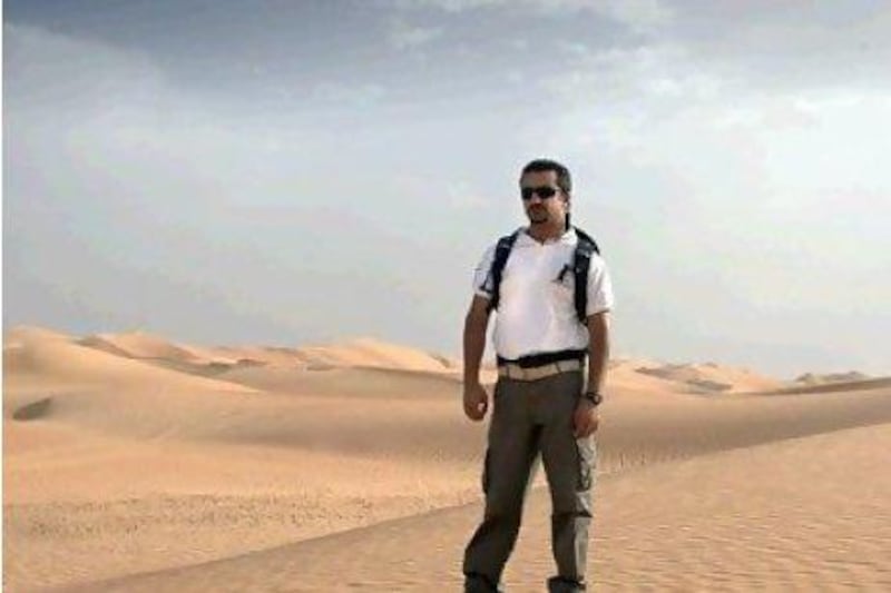 Amer Braik is an activities coordinator at Qasr Al Sarab and runs events like the camel ride, desert bashing and sunset walk. Lee Hoagland / The National
