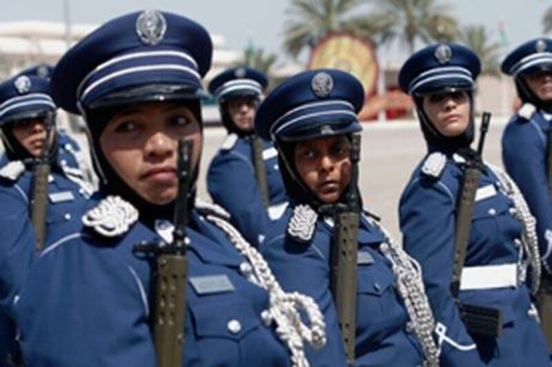 The female graduates march across the parade square during the graduation ceremony of the 19th batch of cadets.