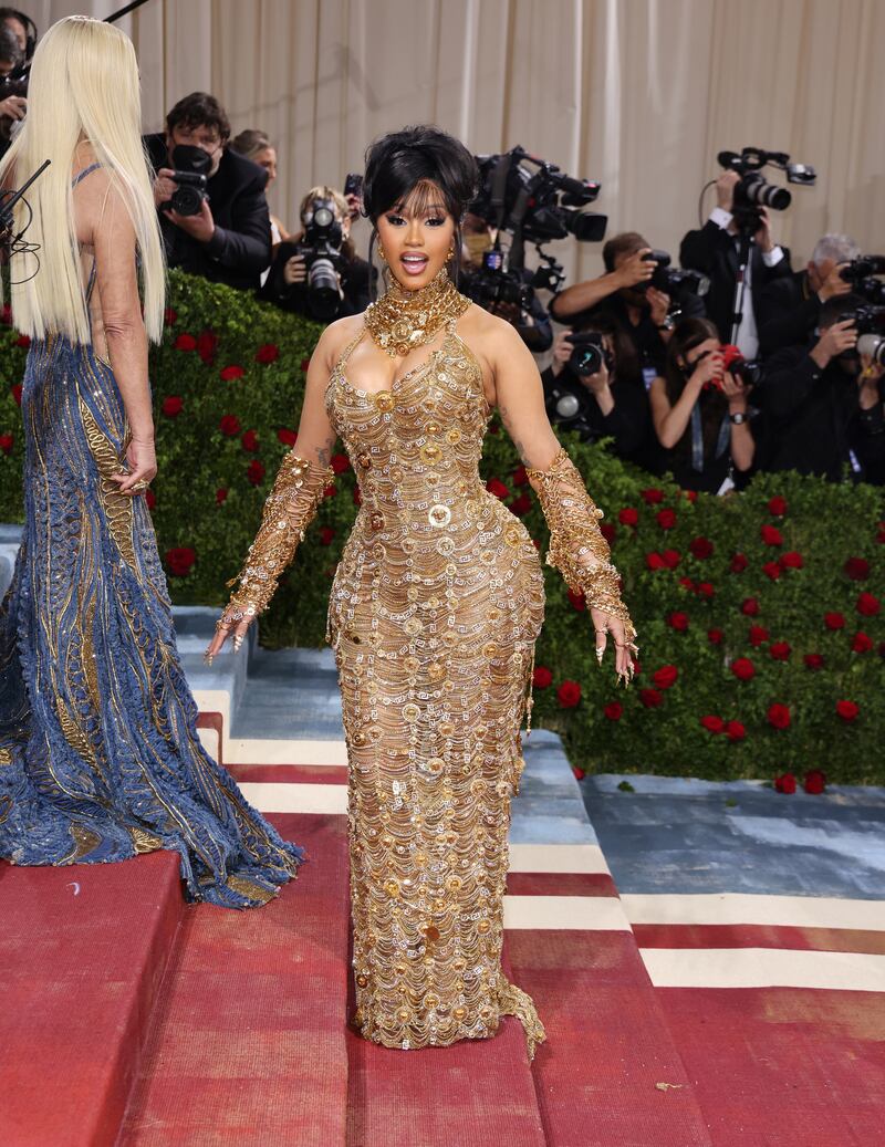 Cardi B, in a gold gown. EPA