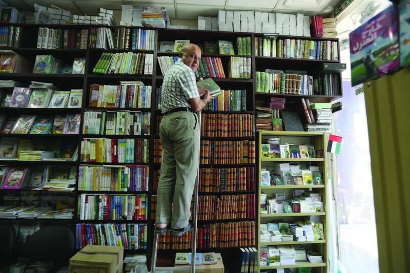 Mohammed Al Sayed at his bookshop, Dar Al Fadeela, in Deira, Dubai. The shop boasts that it has books on ‘everything to do with Arabs’ – its shelves are filled with works that date back as far as the 1920s. Pawan Singh / The National