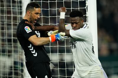 Real Madrid's Vinicius Junior, right, argues with Betis goalkeeper Claudio Bravo. AP Photo
