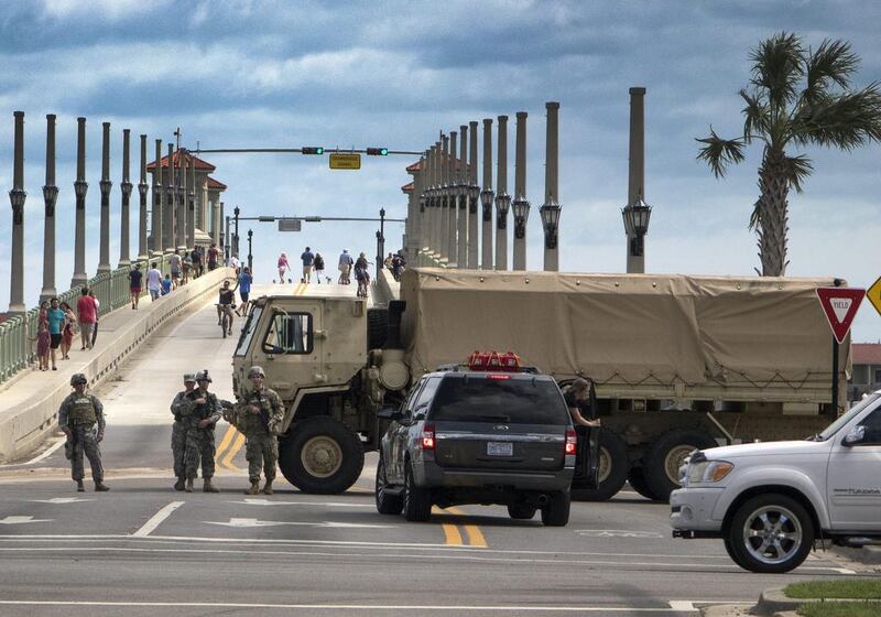 Members of Florida’s National Guard block the entrance of the Lions Bridge in St Augustine, Florida. EPA