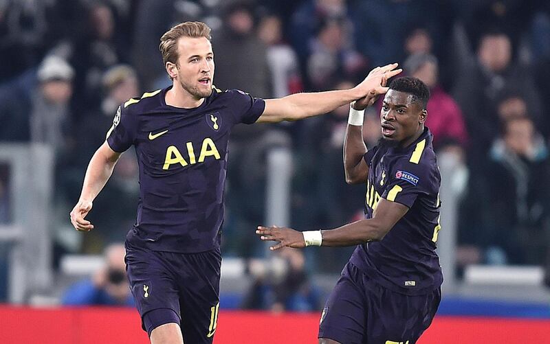 epa06522450 Tottenham's Harry Kane (L) celebrates scoring during the UEFA Champions League round of 16 first leg soccer match between Juventus FC and Tottenham Hotspur at the Allianz Stadium in Turin, Italy, 13 February 2018.  EPA/ALESSANDRO DI MARCO