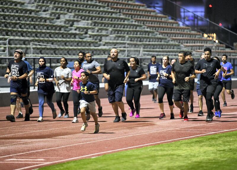 Abu Dhabi Running Team-AD Youssef Rochdi, 37, founder and coach of Abu Dhabi Running Team, free-of-charge running programme that started a week after Covid-19 regulations kicked in last year. It now has over 2,000 members encouraging people of all ages to run at Zayed Sports complex in Abu Dhabi on June 2, 2021. Khushnum Bhandari / The National 
Reporter: Haneen Dajani News