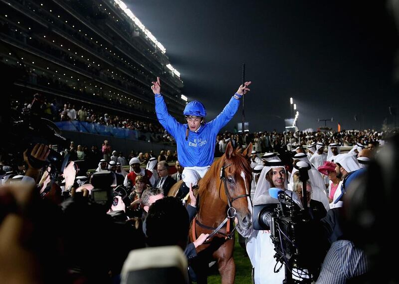 Silvester De Sousa celebrates riding African Story to victory to win the  Dubai World Cup at the Meydan Racecourse on March 29, 2014 in Dubai, United Arab Emirates. Francois Nel/Getty Images