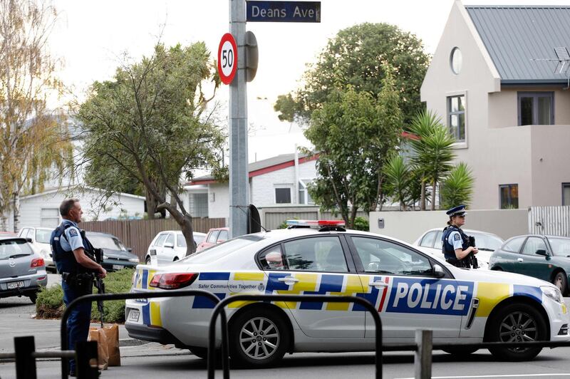 Police officers secure the area in front of the Masjid al Noor mosque after a shooting incident in Christchurch on March 15, 2019.


 Attacks on two Christchurch mosques left at least 49 dead on March 15, with one gunman -- identified as an Australian extremist -- apparently livestreaming the assault that triggered the lockdown of the New Zealand city. / AFP / Tessa BURROWS
