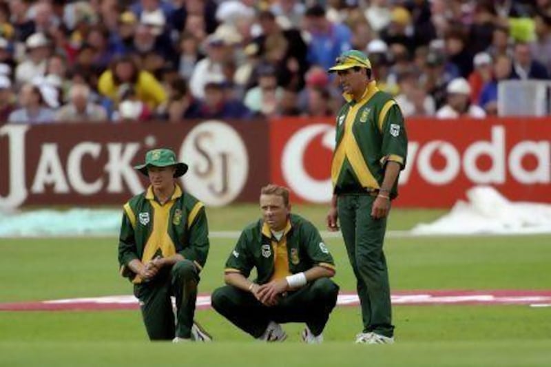 From left, Lance Klusener, Allan Donald and Hansie Cronje of South Africa discuss tactics during the 1999 Cricket World Cup.