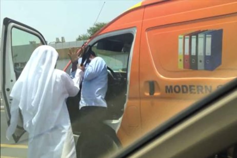 July 16th, 2013 -- In this still image taken from a video posted on Youtube a man is seen involved in an alleged assault on another driver in a road rage incident which is believed to have taken place recently in Dubai. 
