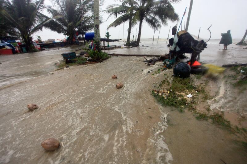 Floodwaters rise over the coastal road as Tropical Storm Pabuk approaches, in Pak Phanang, in the southern province of Nakhon Si Thammarat, southern Thailand. AP Photo