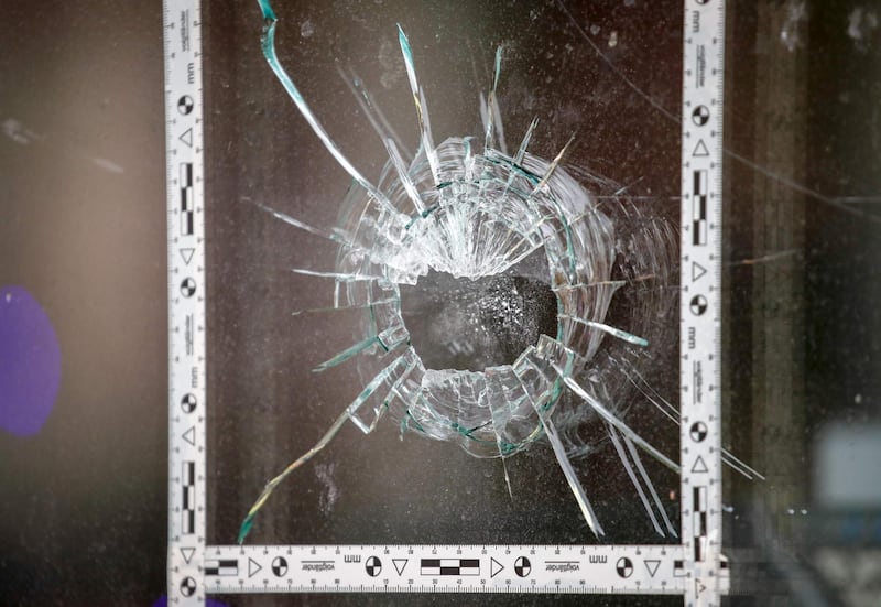 A bullet hole in the a window of a doner kebab restaurant near the synagogue in Halle. AFP