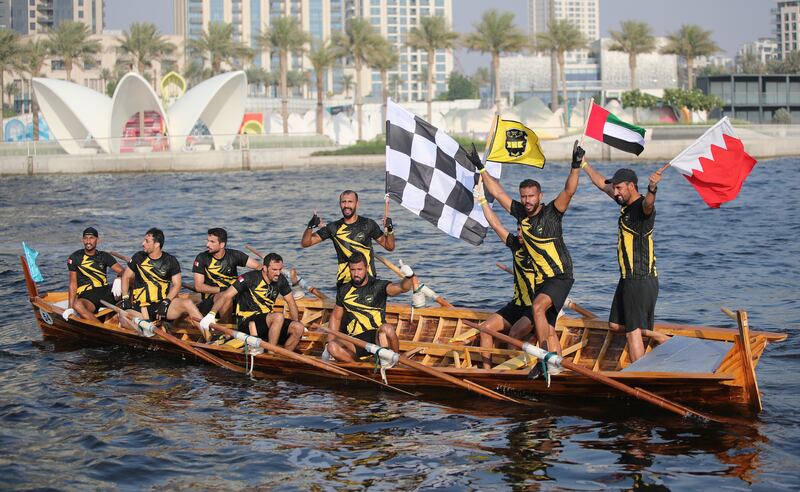 Members of the KHK boat team rejoice after winning the Dubai Traditional Rowing (30-foot) Race open Class.