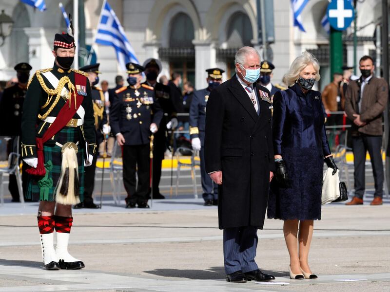 Britain's Prince Charles and his wife Camilla, the Duchess of Cornwall, arrive to lay a wreath at the tomb of the Unknown Soldier in Athens. AP Photo