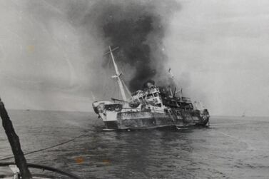 Listing heavily, the burnt out hulk of the SS Dara is shown under tow in this photographed produced at the UK Board of Trade Inquiry in the disaster in April 1961. UK National Archives