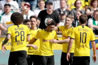 Jadon Sancho, centre, will be a Borussia Dortmund player next season. EPA