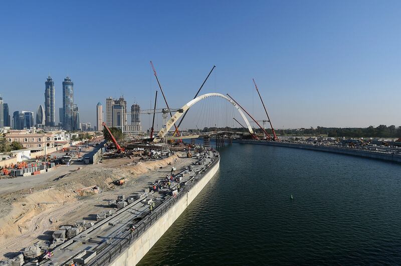 The UAE, and Dubai in particular, held up better than most of their neighbours and led the GCC with more than $36 billion of contracts signed last year. Above, construction activity at the Dubai Canal. Tom Dulat / Getty Images