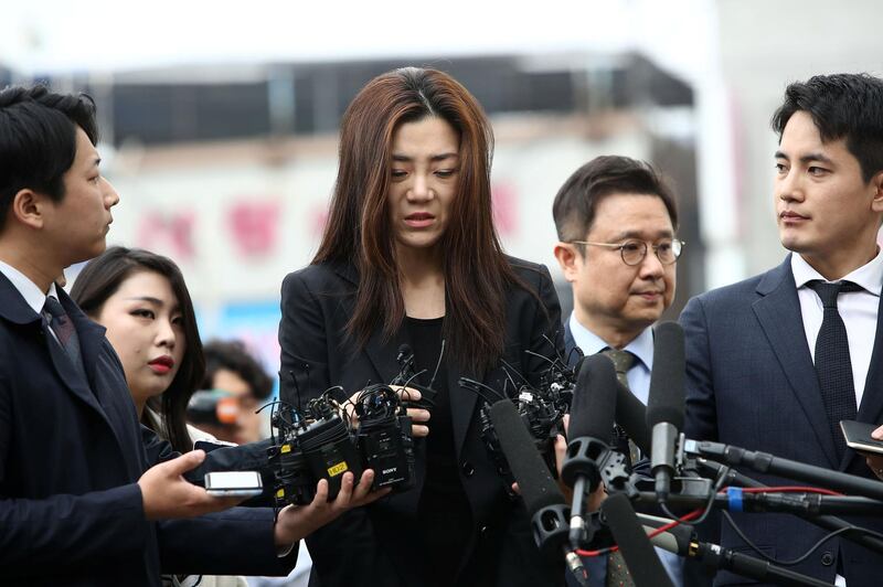 SEOUL, SOUTH KOREA - MAY 01:  Cho Hyun-Min, a 35-year-old Korean Air senior executive and younger daughter of the airline's chairman Cho Yang-ho, speaks with the media as she arrives at the police station on May 1, 2018 in Seoul, South Korea. Police said that they will question Cho Hyun-min, Korean Air senior executive and younger daughter of the airline's chairman Cho Yang-ho as a suspect over allegations on assault and obstruction of business against airline's ad firm manager.  (Photo by Chung Sung-Jun/Getty Images)