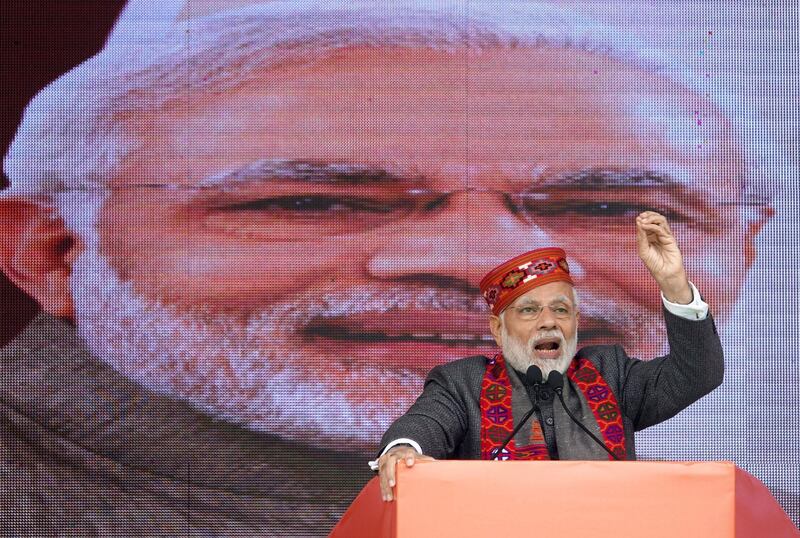 epa07250201 Indian Prime Minister Narendra Modi addresses the gathering during a Bharatiya Janata Party's (BJP) 'Jan Abhar Rally', in Dharamsala, India, 27 December 2018. The rally was organized by the BJP to celebrate one year completion of BJP government in the state of Himachal Pradesh.  EPA/SANJAY BAID