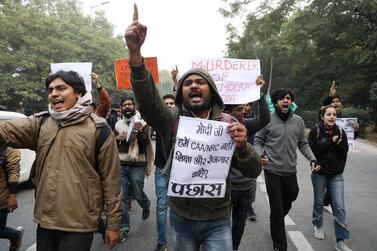Indian student activists shout slogans during a protest against alleged police brutality on protesters in Uttar Pradesh against the Citizenship Amendment Act. EPA