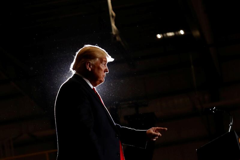 Donald Trump reacts after delivering remarks at a campaign rally at Pensacola International Airport in Florida. Reuters