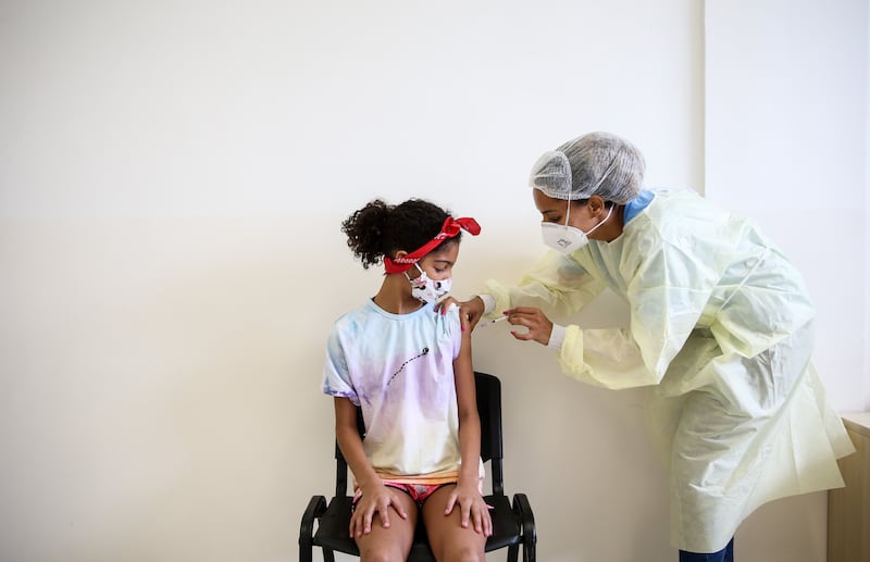 Sarah Santos Costa gets vaccinated in Sao Paulo. Getty Images