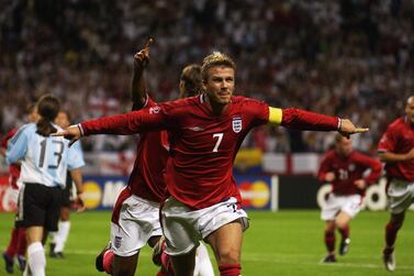 England captain David Beckham celebrates after scoring the winner against Argentina at the 2002 World Cup finals in Japan. Getty