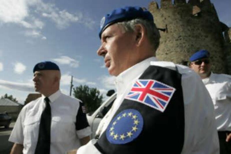 British members of EU observer's contingent ready to leave their base in Georgian town of Mukhrani some 20 km outside Gori on October 1, 2008. European Union observers began deploying in Georgia to monitor a ceasefire and oversee a Russian troop pull-back after the August war in the Caucasus state. AFP PHOTO / VANO SHALMOV *** Local Caption ***  385221-01-08.jpg