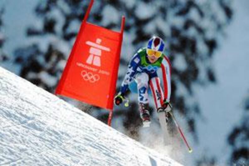 America's Lindsey Vonn, whose participation had been threatened by injury, hurtles downhill to Olympic gold at Whistler.