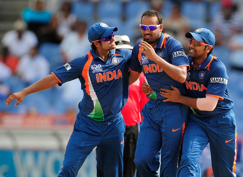 India celebrate after taking the wicket of Sri Lankan batsman Tillakaratne Dilshan during their T20 World Cup match at the Beausejour Cricket Ground in St. Lucia on May 11, 2010. AFP