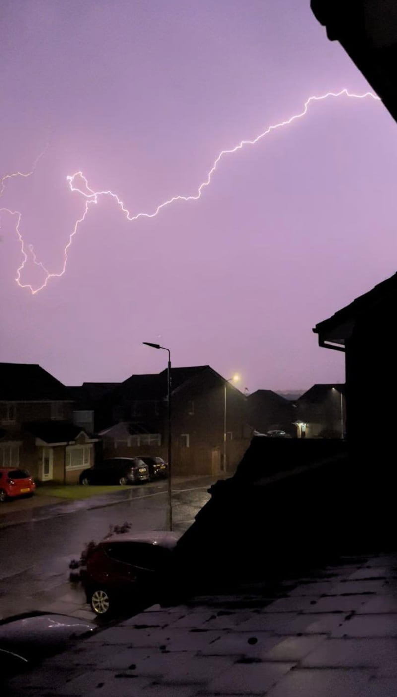Lightning striking across Wishaw, North Lanarkshire. PA