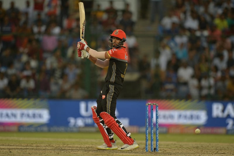 Royal Challengers Bangalore cricketer Shivam Dube plays a shot during the 2019 Indian Premier League (IPL) Twenty20 cricket match between Delhi Capitals and Royal Challengers Bangalore at the Feroz Shah Kotla cricket stadium in New Delhi on April 28, 2019. (Photo by Sajjad HUSSAIN / AFP) / ----IMAGE RESTRICTED TO EDITORIAL USE - STRICTLY NO COMMERCIAL USE-----