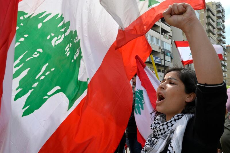 epa08398899 A protester shouts slogans during a protest at Al Nour Square in Tripoli, northern Lebanon, 03 May 2020. Anti-government protesters from across Lebanon arrived in the Lebanese city of Tripoli to show support of demonstrators of the city after the alleged death of a protester Fawaz Al Samman in clashes with the Lebanese army on 28 April 2020.  EPA/WAEL HAMZEH