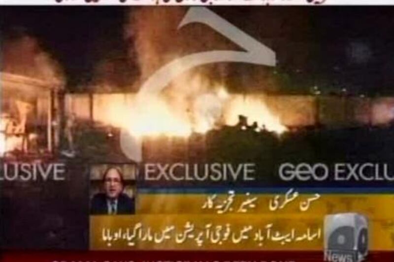 An image made from Geo TV video shows flames at what is thought to be the compound where terror mastermind Osama bin Laden was killed Sunday, May 1, 2011, in Abbatabad, Pakistan. (AP Photo/GEO TV) TV OUT, NO SALES *** Local Caption ***  NY219_Bin_Laden.jpg