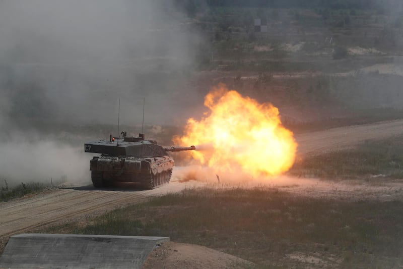 British Army Challenger tank of the NATO enhanced Forward Presence battle group based in Estonia, fires during certification field tactical exercise in Adazi, Latvia June 18, 2020. REUTERS/Ints Kalnins
