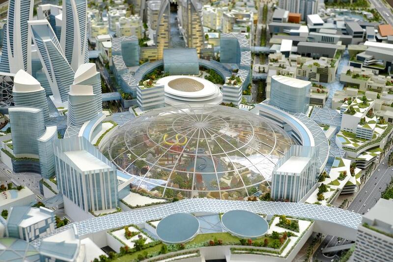 The planned Mall of the World complex will encompass an 8 million square foot mall connected to a theme park, 100 hotels and serviced apartment buildings with 20,000 rooms. But for now, visitors can view the scaled version at Emirates Tower's main atrium. Antonie Robertson / The National