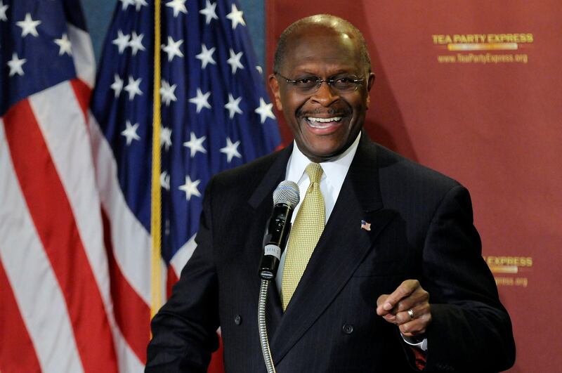 FILE PHOTO: Former Republican presidential hopeful Herman Cain delivers the Tea Party Express response to U.S. President Barack Obama's State of the Union Address, at the National Press Club in Washington January 24, 2012.   REUTERS/Jonathan Ernst/File Photo