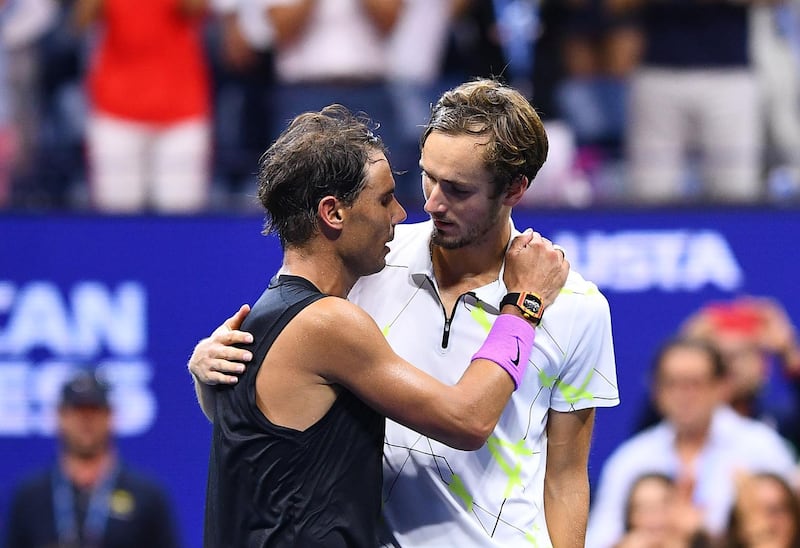 Rafael Nadal of Spain embraces his opponent Daniil Medvedev after the match. AFP