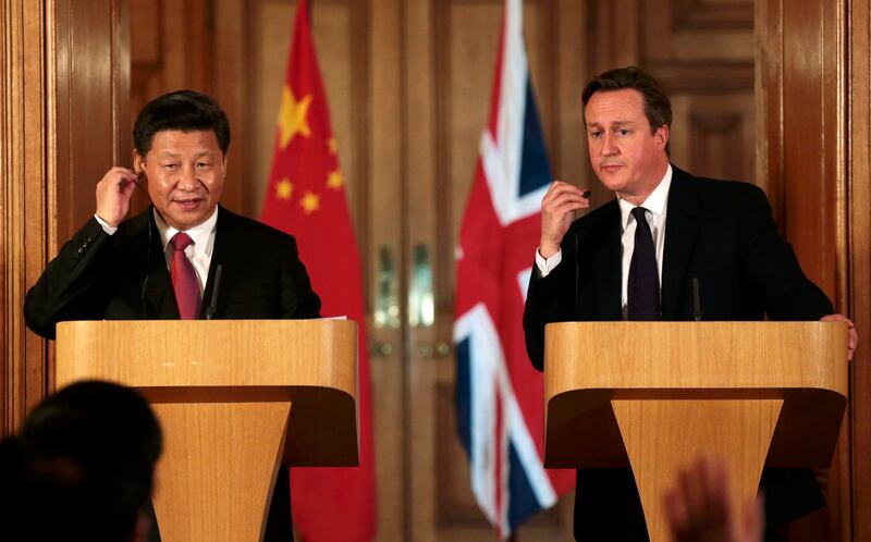 China's President Xi Jinping and David Cameron at a joint press conference in 10 Downing Street in 2015. Getty Images