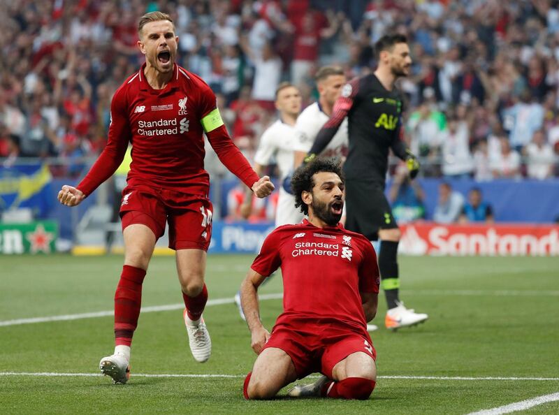 Salah celebrates scoring their first goal from the penalty spot. Reuters