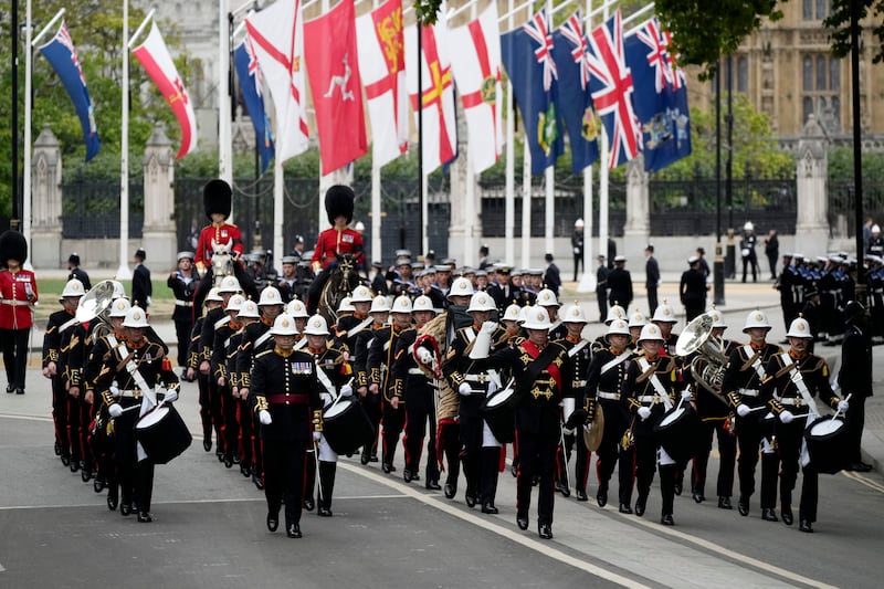The Royal Marines band marches to Westminster Abbey. Getty Images