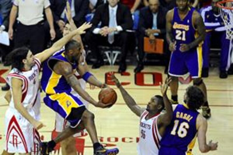 LA's Kobe Bryant, with the ball, scored at crucial times.