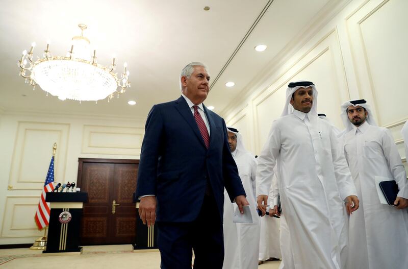 U.S. Secretary of State Rex Tillerson departs with Qatar's Foreign Minister Sheikh Mohammed bin Abdulrahman Al Thani after a media availability, in Doha, Qatar October 22, 2017. REUTERS/Alex Brandon/Pool     TPX IMAGES OF THE DAY