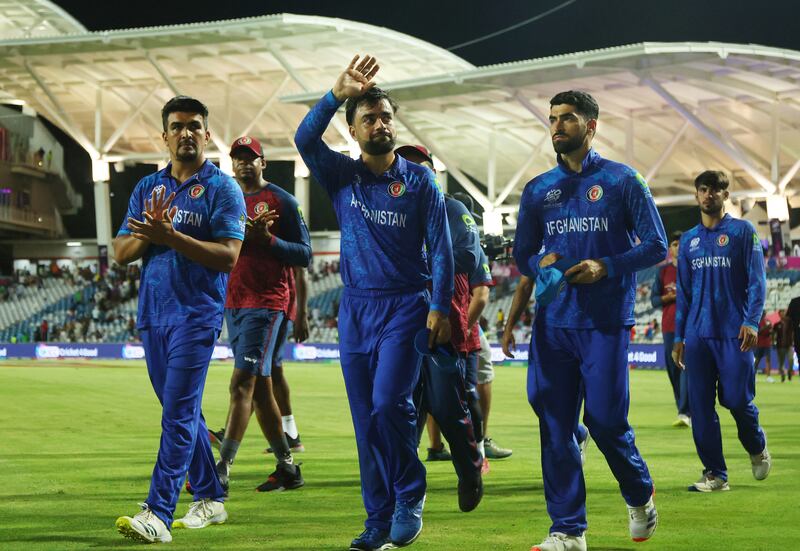 Afghanistan's Rashid Khan and teammates after losing to South Africa in the T20 World Cup semi-final in Trinidad. Reuters
