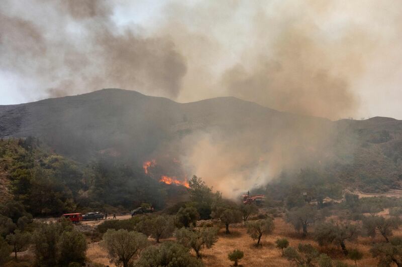 Firefighters were on Wednesday tackling a blaze near Vati on Rhodes. AFP