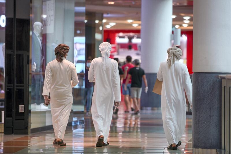 Abu Dhabi, United Arab Emirates, May 24, 2020.  
    Abu Dhabi residents at the Al Wahda Mall on the first day of Eid Al Fitr.
Victor Besa  / The National
Section:  Standalone / Stock