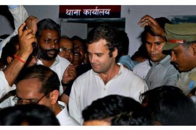 Rahul Gandhi walks out of Kasna police station on his release after he was arrested for joining a protest by farmers over alleged inadequate compensation from a state government for land bought to build a highway on the outskirts of the Indian capital.