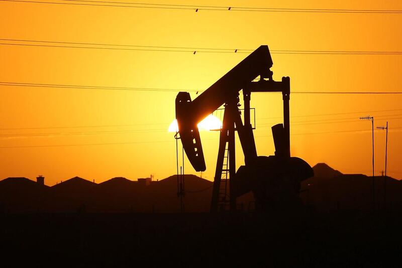 Above, a pumpjack in the Permian Basin oil field on the outskirts of Midland, Texas. Spencer Platt / Getty Images / AFP