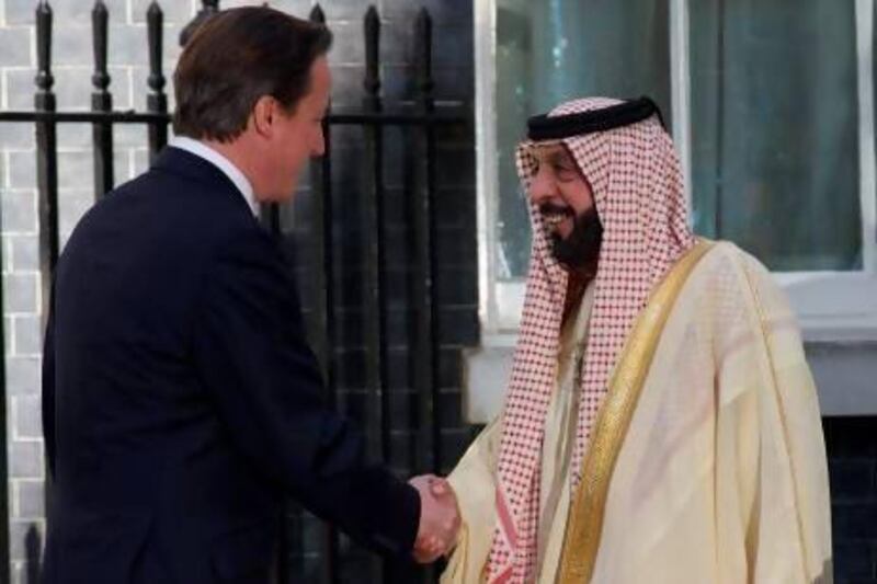 Britain's prime minister David Cameron greets UAE President Sheikh Khalifa bin Zayed at 10 Downing Street.