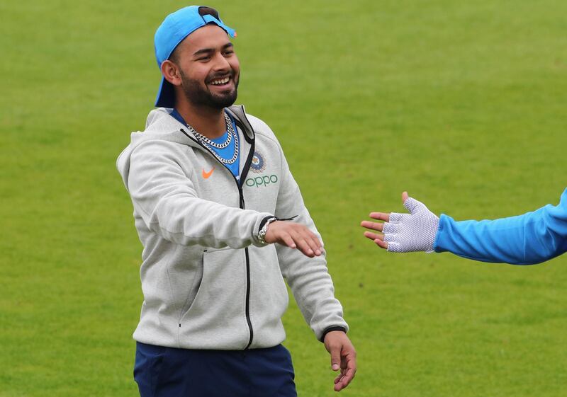 India's Rishabh Pant shares a light moment with a teammate during a training session ahead of their Cricket World Cup match against Afghanistan at the Hampshire Bowl in Southampton, England, Wednesday, June 19, 2019. (AP Photo/Aijaz Rahi)